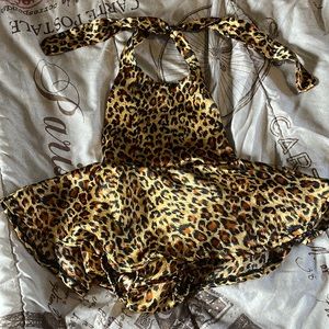 Super silky, leopard print,  baby girl dress, ties around neck.